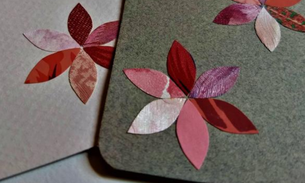 closeup of pink pinwheel style flowers cut from wallpaper